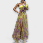 Elegant evening dress with one shoulder strap and tailored cut