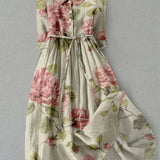 Lucía vintage floral dress with an adjustable laced waist